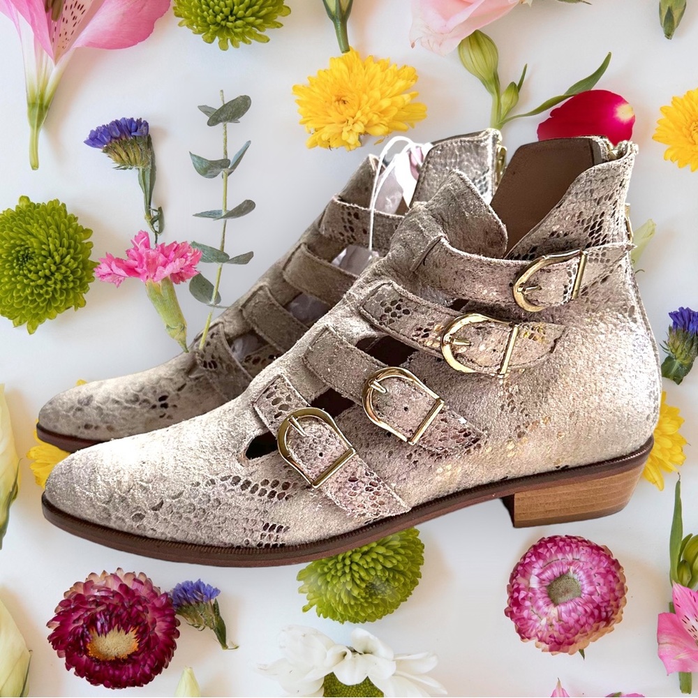 Gold snakeskin booties with buckle detail. Dresses up or down! Size 37 NWT